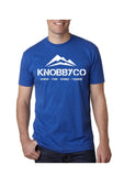 Royal Blue KnobbyCo brand mountain bike t-shirt with mountains and tag line. Wake. Ride. Sleep. Repeat.